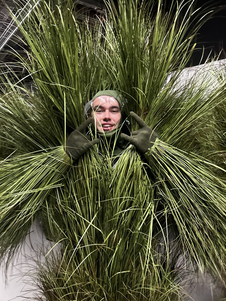 Aidan in the bush ghillie suit for the Super Bowl halftime show
